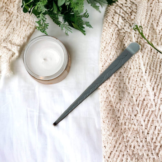 Candle Dipper to help extinguish your candle flame and straighten out the wick after burning.