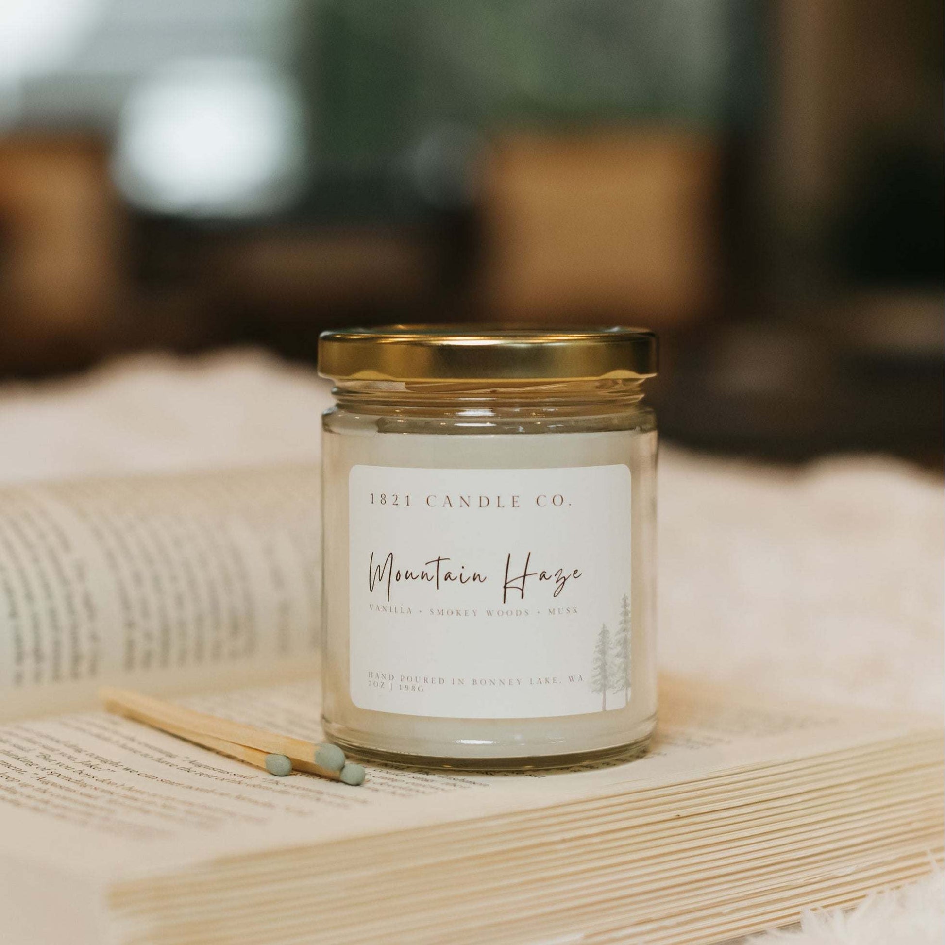 Mountain Haze 7oz Candle made by 1821 Candle Co. Toxin free fragrance inspired by the rugged mountain air with notes of vanilla, lavender and woods.