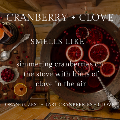 cranberry and clove infographic smells like simmering cranberries on the stove with hints of clove in the air. notes of orange zest, tart cranberries, clove