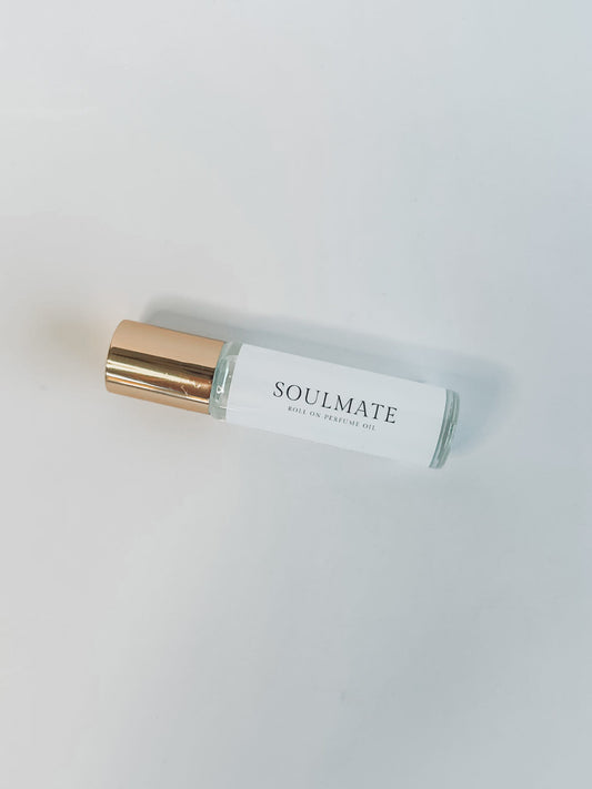 Soulmate Coconut Based Roller Perfume - Non Toxic handmade perfume for women featuring notes of red apply, lily, jasmine in a clear roller perfume vial and gold lid.