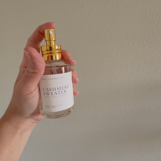 video clip of cashmeres sweater home + body mist in use showing a fine mist spray.